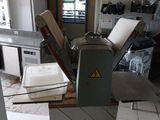 a picture of a room that has a lot of stuff on the floor