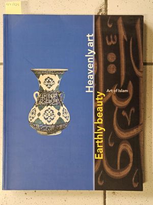two books that are sitting on a tile floor