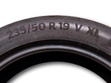 an image of a close up of a tire on a white background