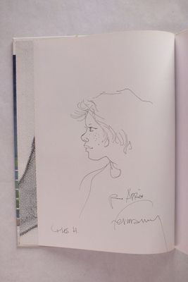 dessin au crayon représentant le visage d'une femme dans un livre