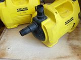 two yellow pressurers sitting on top of a wooden table