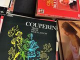 many books that are stacked on top of each other