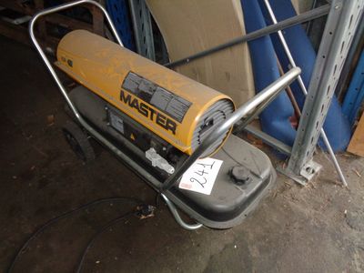 a machine that is sitting on a cart in a garage