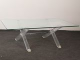 rectangular clear glass coffee table with clear acrylic legs