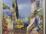 une peinture à l'huile représentant une terrasse avec une table et des chaises
