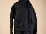 an image of a black coat on a mannequin