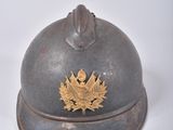 a helmet with a maple leaf on it sitting on a table