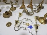 a lot of brass items on the table