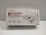 an image of a box of microneeding rollers on a table
