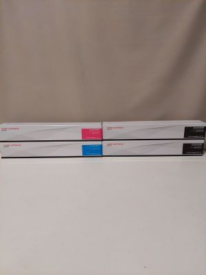 two white boxes with pink and blue labels sit on top of each other