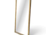an image of a gold framed mirror on a white background