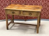 a small wooden table with two drawers on it
