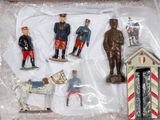 a box of toy figurines in the shape of soldiers