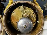 a clock that is sitting on top of a table