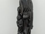an image of a statue of a man with a hat on his head