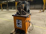 a machine that is sitting on a pallet in a warehouse