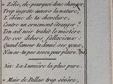 an old book with writing on it sitting on a table