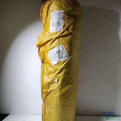 a large bag of food wrapped in plastic on a table