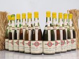 six bottles of wine are lined up in a row
