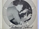 an old book with a black and white photo of a man working on a machine