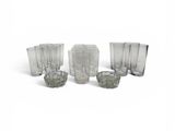 a group of glasses that are sitting on a table