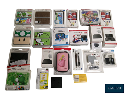 beaucoup de jeux et d'accessoires Nintendo Wii posés sur la table