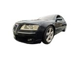 black car on a white background with a white background behind it