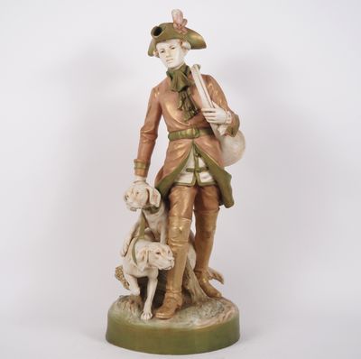 ROYAL DUX. Grand groupe en biscuit polychrome "chasseur et s…