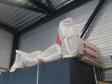 boxes stacked on top of each other in a warehouse