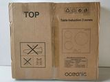 two boxes are sitting next to each other on a table