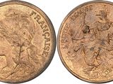 a close up of a coin with a woman on it