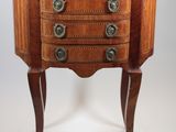 an image of a small wooden table with a marble top
