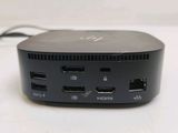 a close up of a small black device on a table