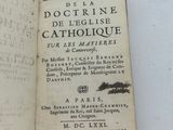 an open book with a yellow label on it sitting on a table