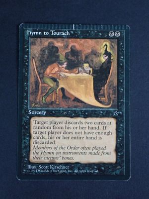 a close up of a card with a picture of a person sitting at a table