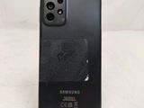 a close up of the back of a black samsung galaxy s20