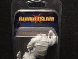 a close up of a plastic figure of a person on a skateboard