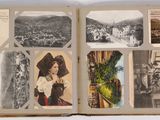 an open book with pictures of a woman in a hat and other pictures