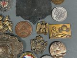 a lot of coins and other metal items on a table