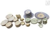 a lot of plates and cups on the table