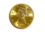 l'image d'une pièce d'or sur laquelle figure une tête de femme