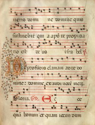 an old manuscript with a red and black writing on it