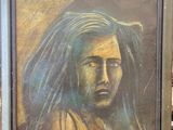 painting of a woman with long hair in a frame