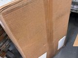 boxes are stacked on top of each other in a warehouse