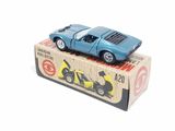 a blue toy car sitting on top of a box