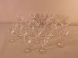 a lot of wine glasses sitting on a table