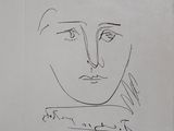 an image of a drawing of a man ' s face on a piece of paper