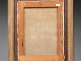 an old photo of a picture frame with a piece of paper in it
