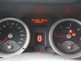 two gauges on the dashboard of a car