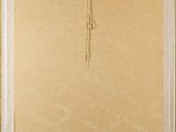 painting of a cross hanging on a wall in a room